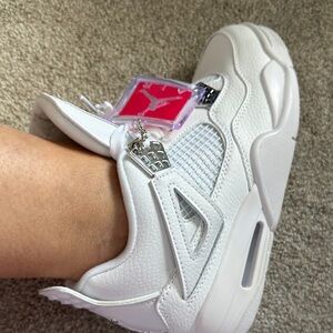 Jordan White Leather Retro Sneaker with Pink Jumpman Tag